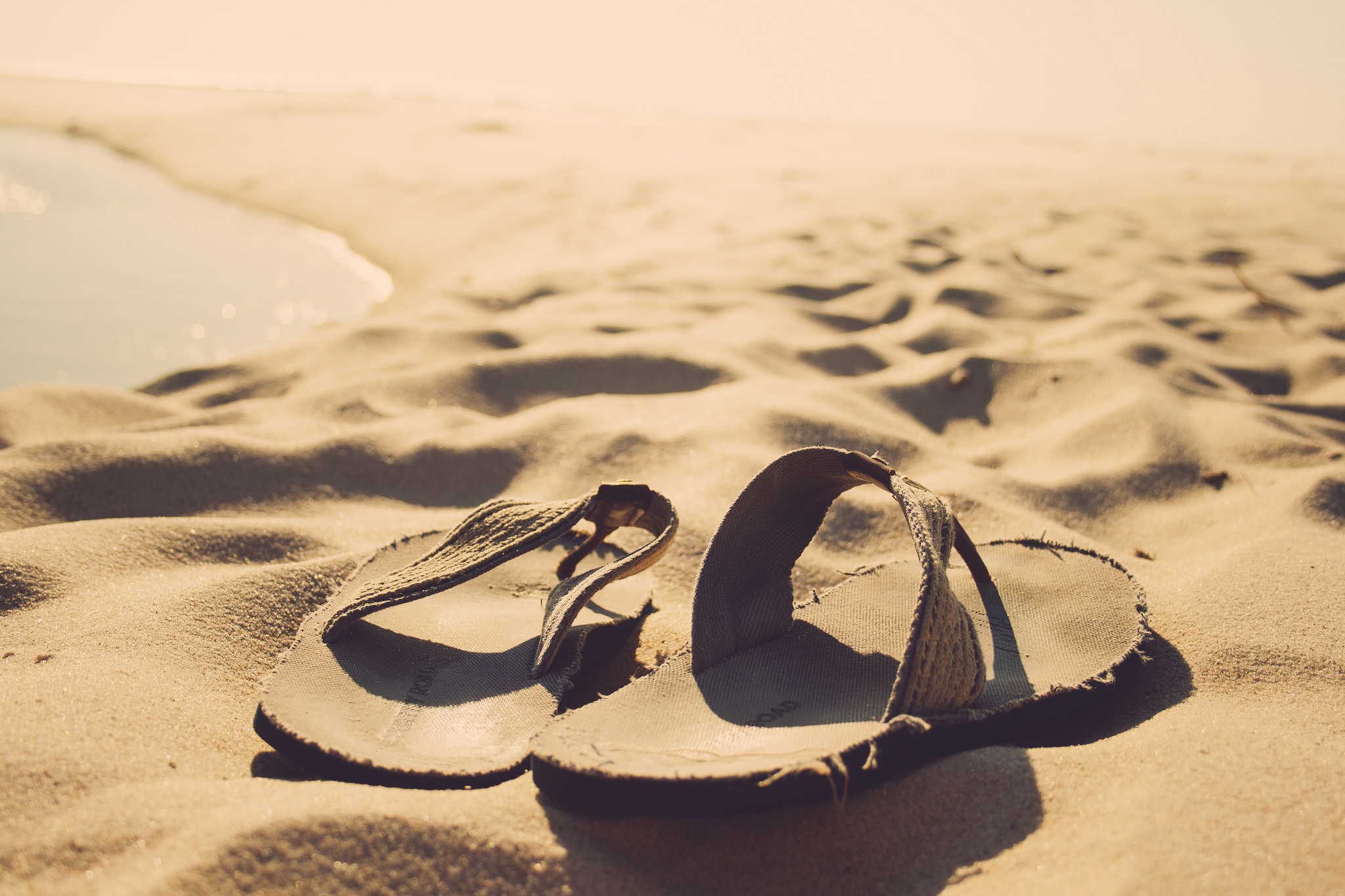 Thongs in sand